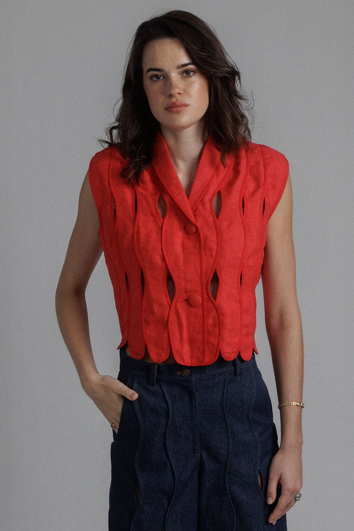 RED IRREGULAR ASSEMBLED CROP TOP