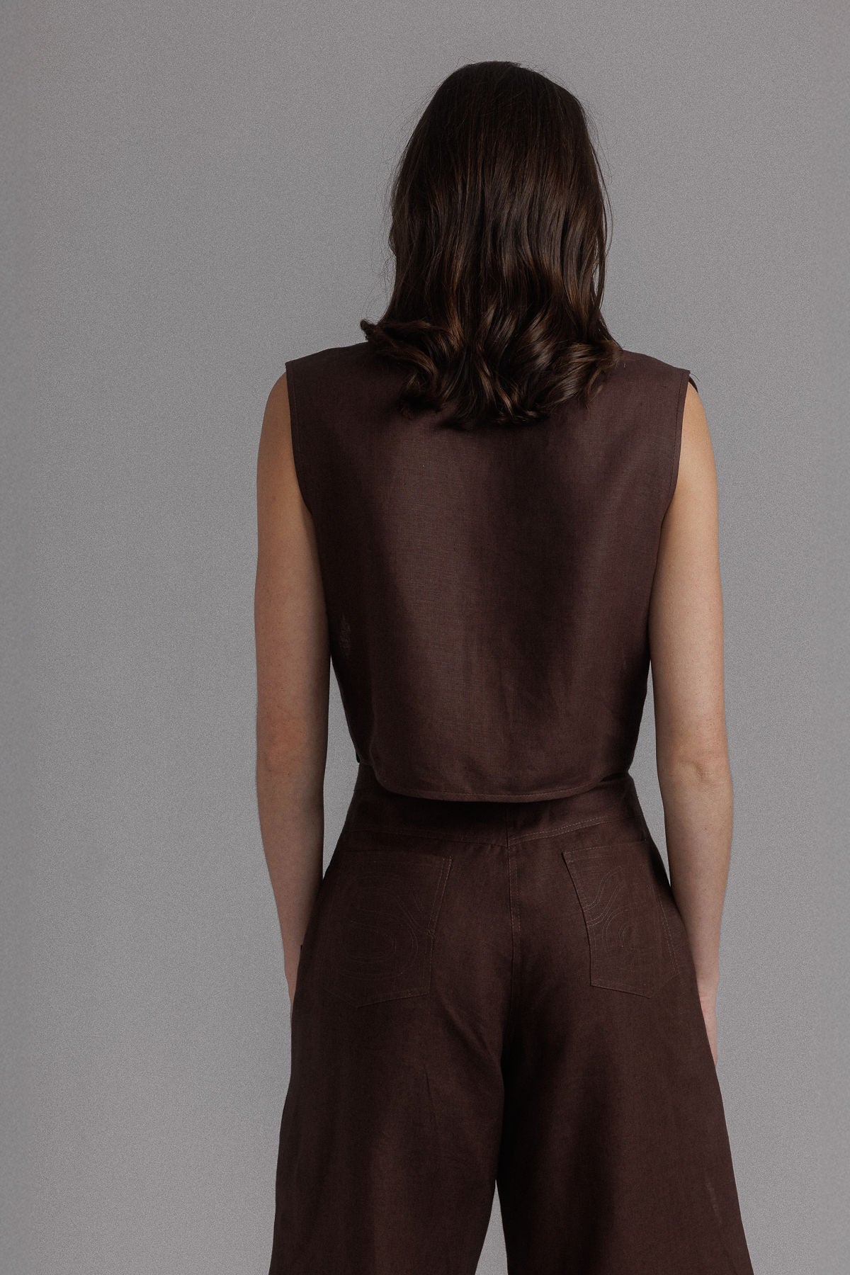 CHOCOLATE IRREGULAR ASSEMBLED CROP TOP